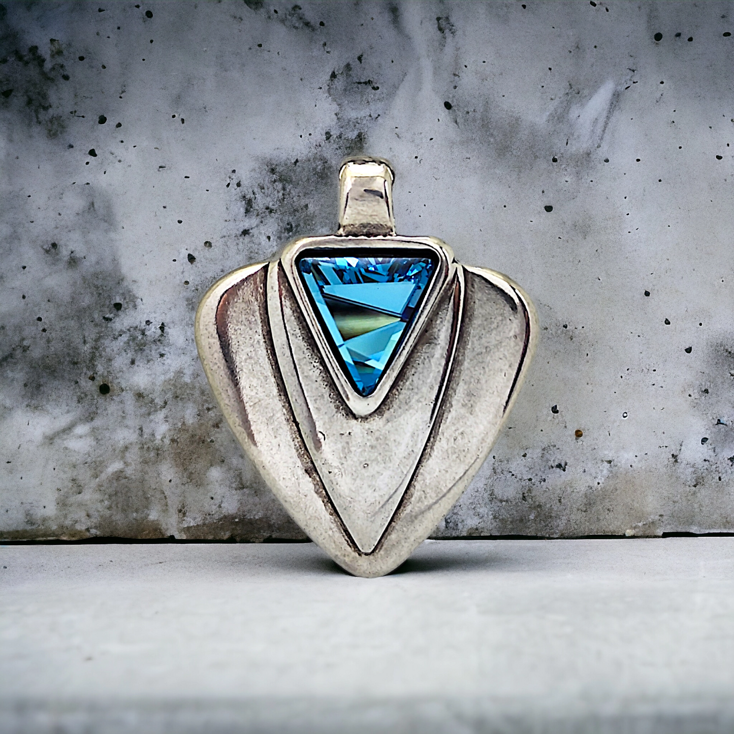 COLGANTE TRIANGULAR