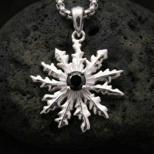 Colgante eguzkilore con espinela negra de plata 