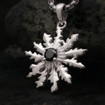 Colgante eguzkilore flor del sol con espinela negra de plata