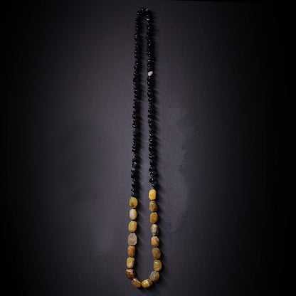Collar de piedras amarillas y negras de canto rodado, piedras naturales irregulares sin metales