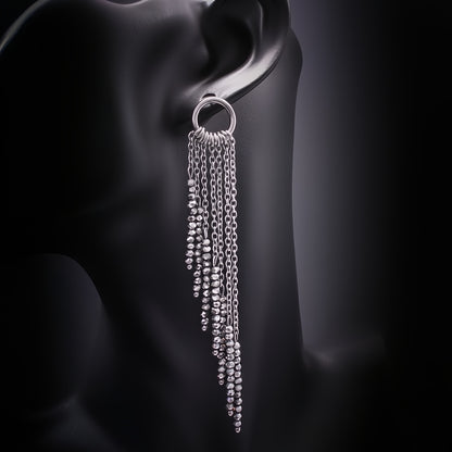 Pendiete cadenas de acero largos con cristales plateados y base redonda