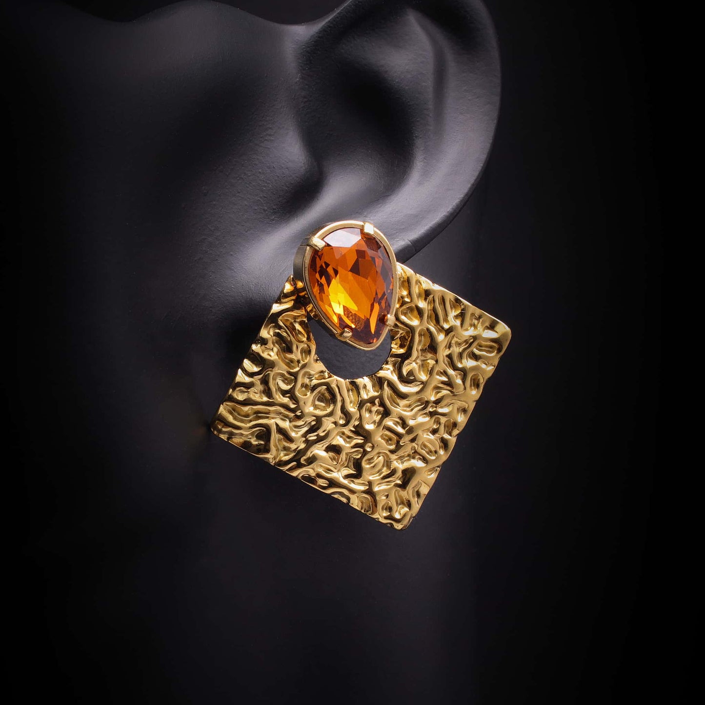 Pendientes dorados de acero inoxidable con cristal topacio.